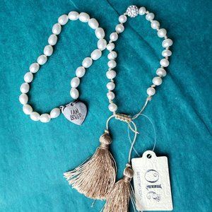 2/15$ Lot of 2 white  freshwater pearl bracelet